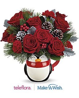 A Teleflora\'s Send a Hug - North Pole Penguin Bouquet.